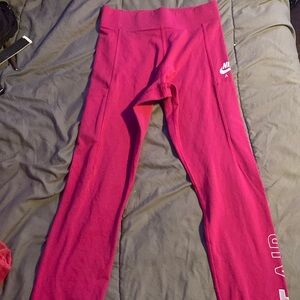 Pink Nike leggings.